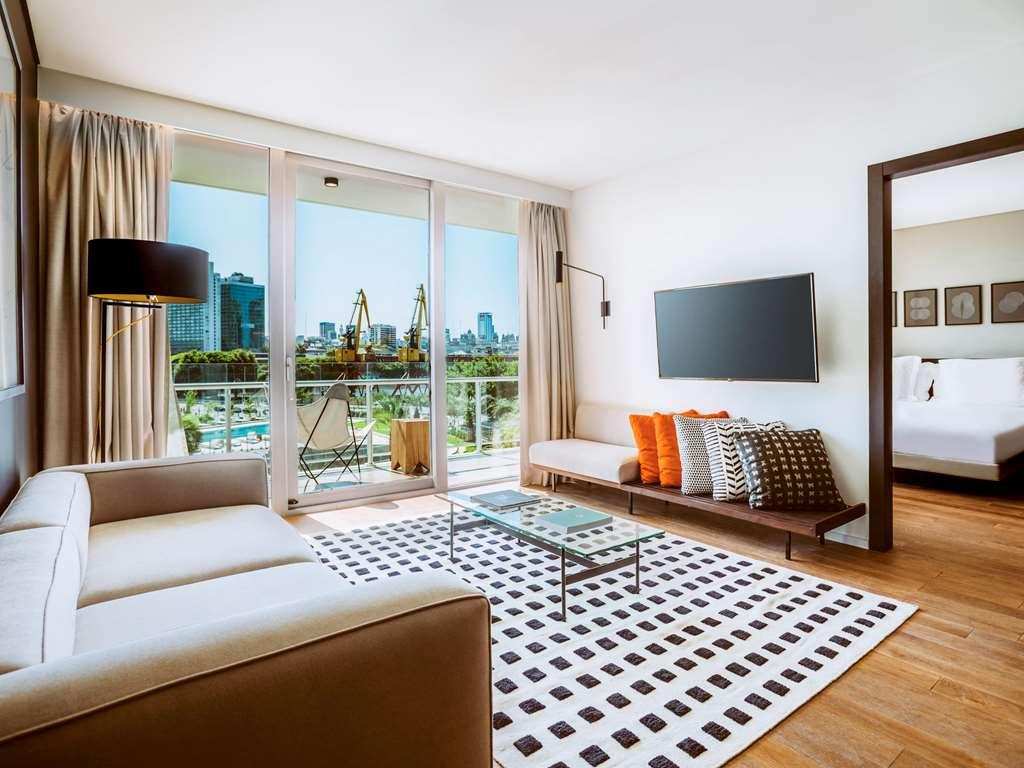 Sls Buenos Aires Puerto Madero Hotel Ruang foto A suite at the hotel